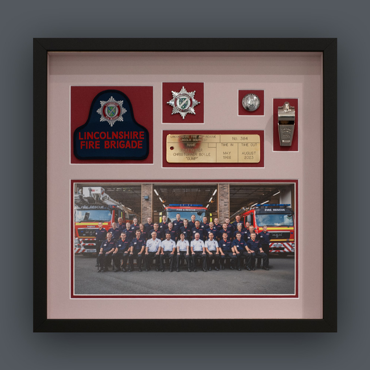 Lincolnshire Fire Brigade service kit, badge, whistle and crew photograph, deep box framed.